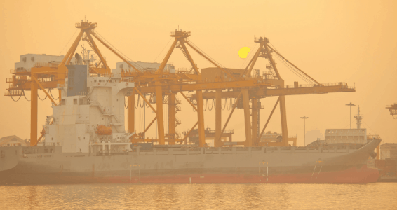shipping vessel in golden fog